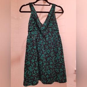 Green and black floral mini dress